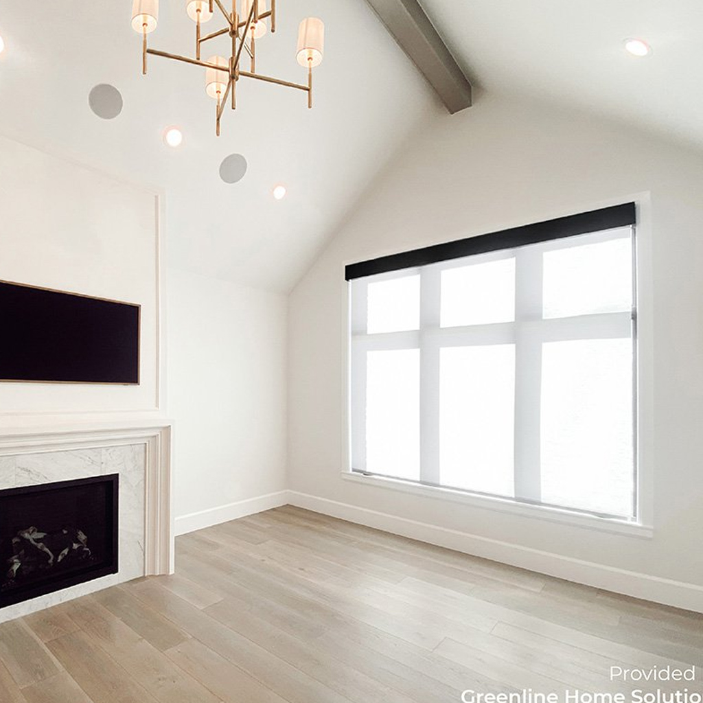 smart-shades_automatic-window-shades_greenline-photo-01 A bedroom with a backdrop of Automatic Window Shades known as Smart Shades by Ridgeline. Ridgeline Roofing and Solar is a proud Powershades dealer.