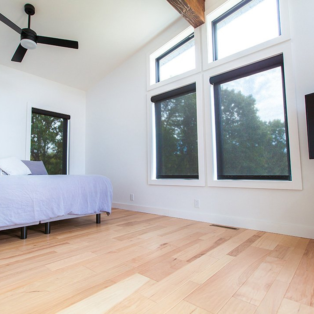 smart-shades_automatic-window-shades_smart-shades_automatic-window-shades_bedroom-02 A bedroom with a backdrop of Automatic Window Shades known as Smart Shades by Ridgeline. Ridgeline Roofing and Solar is a proud Powershades dealer.